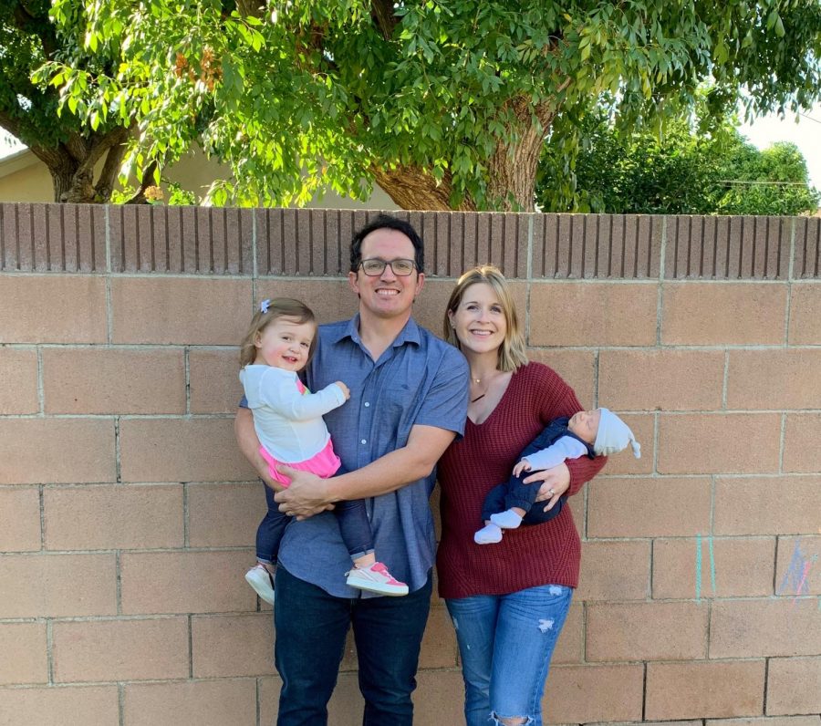 Mrs. Contreras poses for a photo with her family.