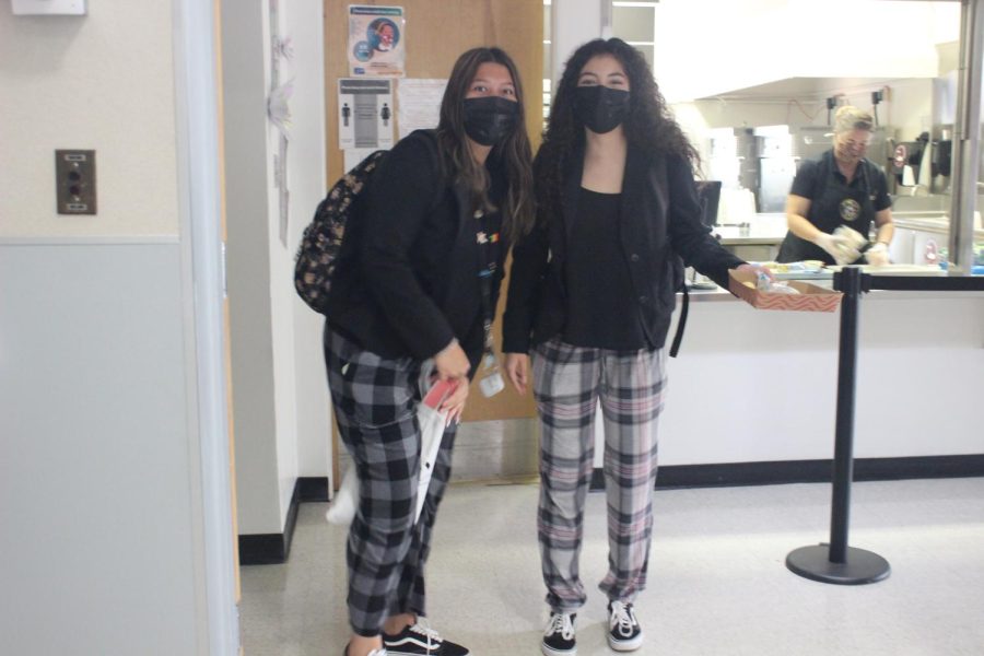 Students wearing pajamas on bottom and outwear on top for Zoom Day.