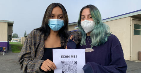 Seniors Brittany Gutierrez and Daniela Arreola holding a QR Code for the Dress Code Survey. These Mt. SAC ECA students helped create the survey and are dedicated to having students voices heard and represented. 