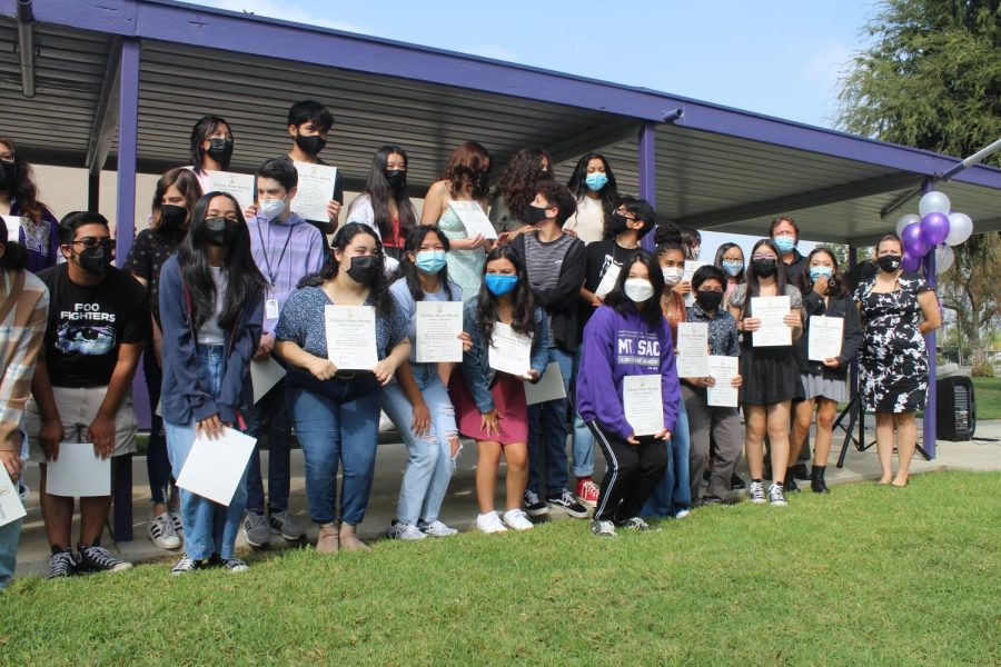 Mt. SAC’s NHS members are shown posing after winning an awards ceremony.