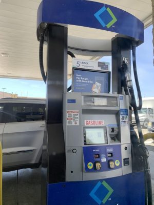 Person spends a whopping $65 for 12 gallons of gas at a Sams Club gas station where the gas is cheaper than at regular gas stations. 