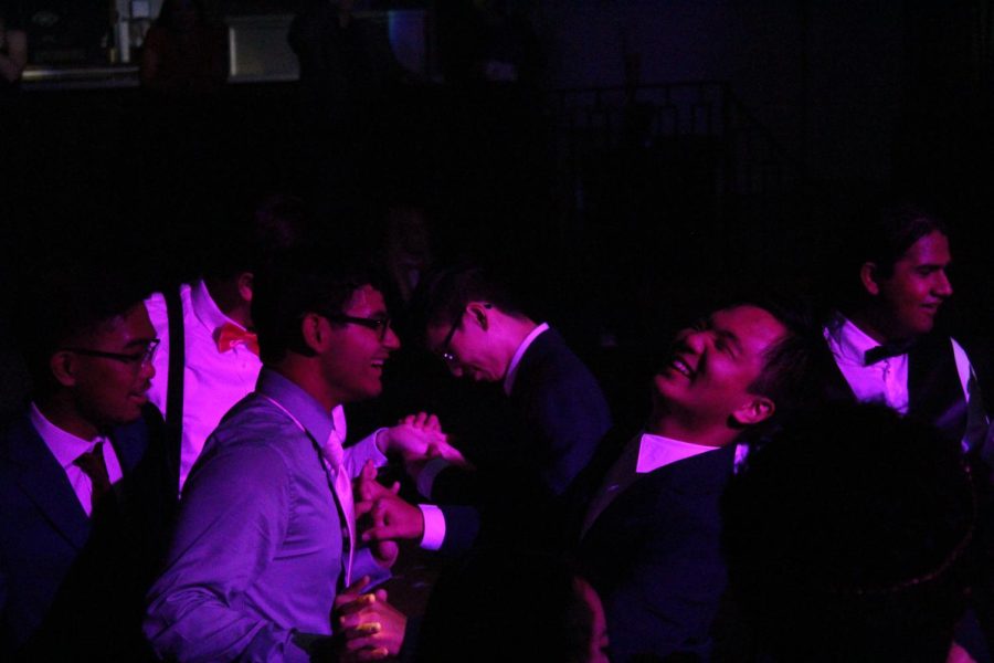Ruben Barbero, Rene Luna, Kenneth Pham, Matthew Tseng and Jaytin Sampat enjoy the dance floor together, as Luna and Tseng share a laugh. 