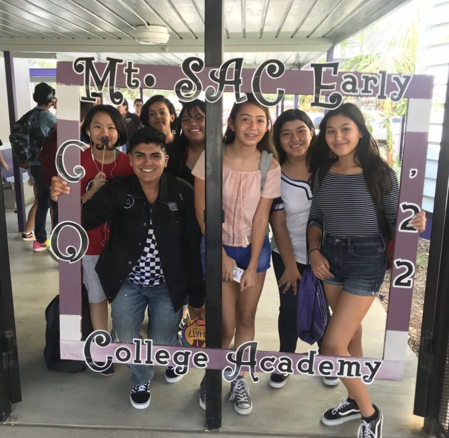 From left to right, Freshmen Kelen Trieu, Anisa Oza, Tevin Perez, Trennian Moralde, Neiyell Arias,  Anamarie Javier, and Valerie Arias all pose at the entrance of the school.
