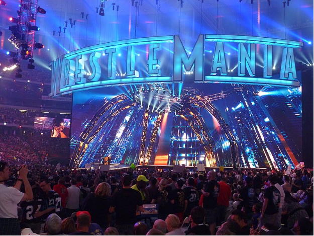 Wrestlemania 38’s matches featured WWE talents such as Edge, The Street Profits, AJ Styles, Alpha Academy, Austin Theory, Sami Zayn, RK-Bro, Rhea Ripley, Kevin Owens, and Ronda Rousey. Johnny Knoxville and Logan Paul were also featured in Wrestlemania. 
Photo provided by KinkESizemore on Own Work