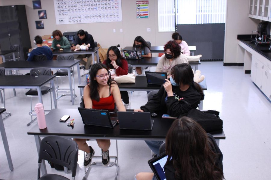 Gigi Mondragon (front left), Dolce Chacon (front right), Michelle Callinisan (back left), and Autumn Pagan (back right) avidly study for their upcoming Academic Decathlon competition during their meeting on Tuesday Oct. 11.