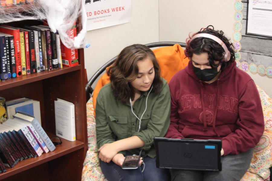 Lauryn (left) and Autumn (right) listening to Midnights while writing this article.