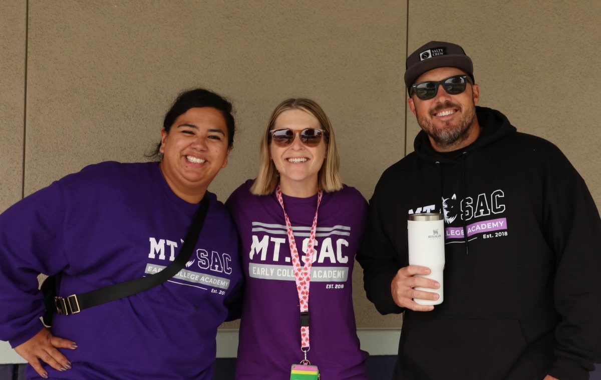 Dr. Katarina Garcia, Claire Contreras, and Matt Johnson enjoying each others company at MECA's annual Pancake Breakfast. 