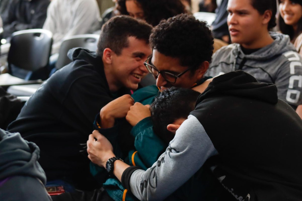 Samuel Amador (12), Adrian Cordon (12) and their friends enjoy the House Competition.