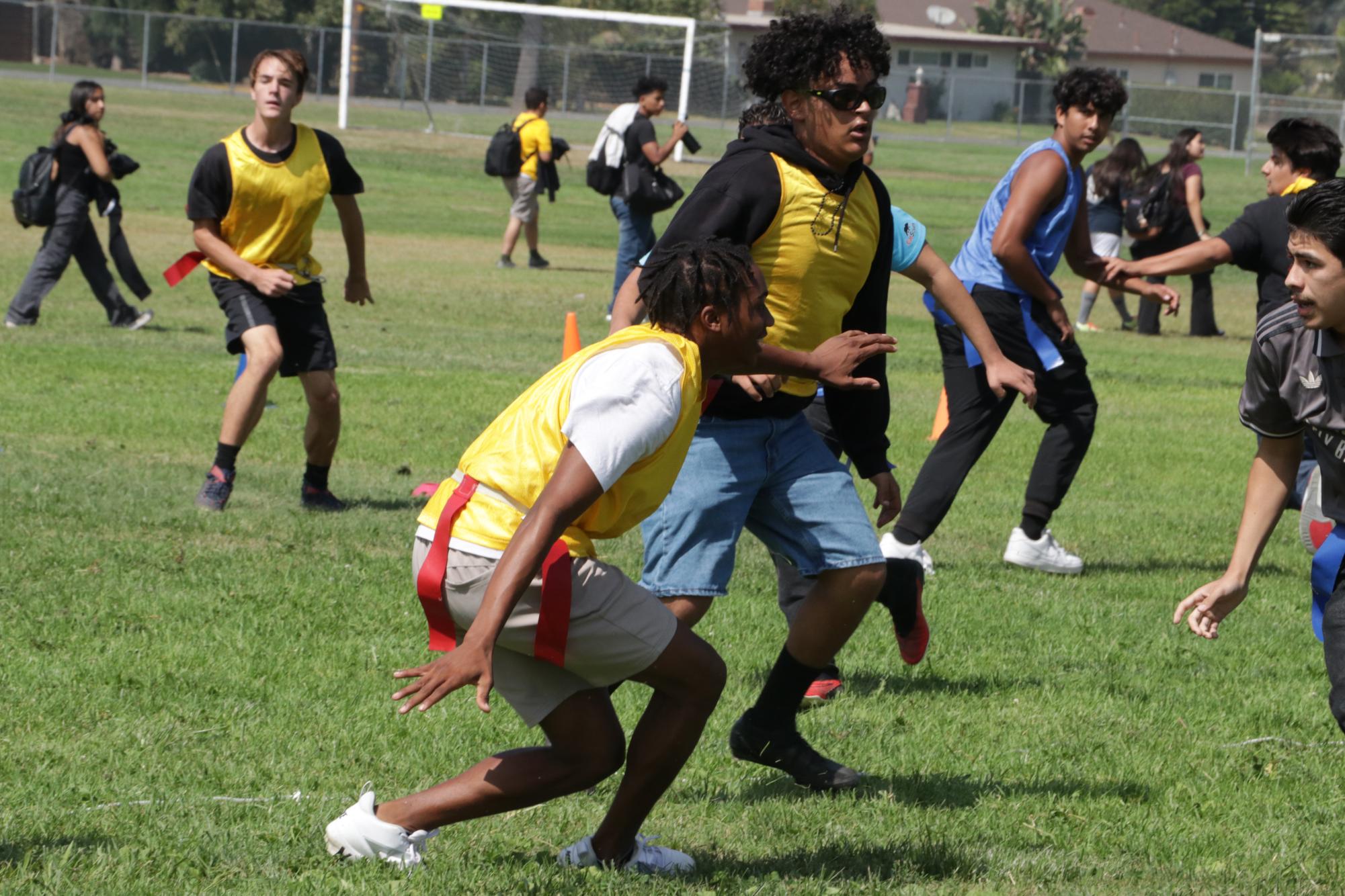 Xander Small (12) and Andres Bocardo (12) playing football at MECA's first 2024-25 House Comp Game