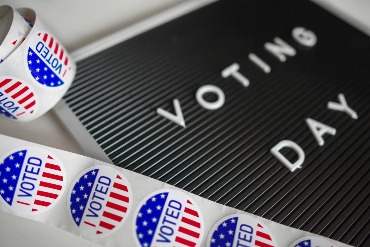 A word board representing voting day along with a roll of voting stickers! (Photo provided by: Element5 Digital)