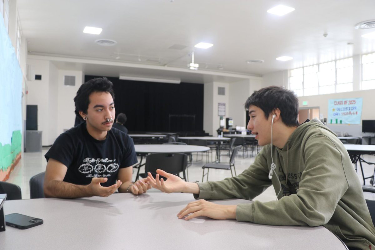 Seniors (left to right) Alonzo Galindo and Gabriel Metzgar discussing the importance of their privacy.