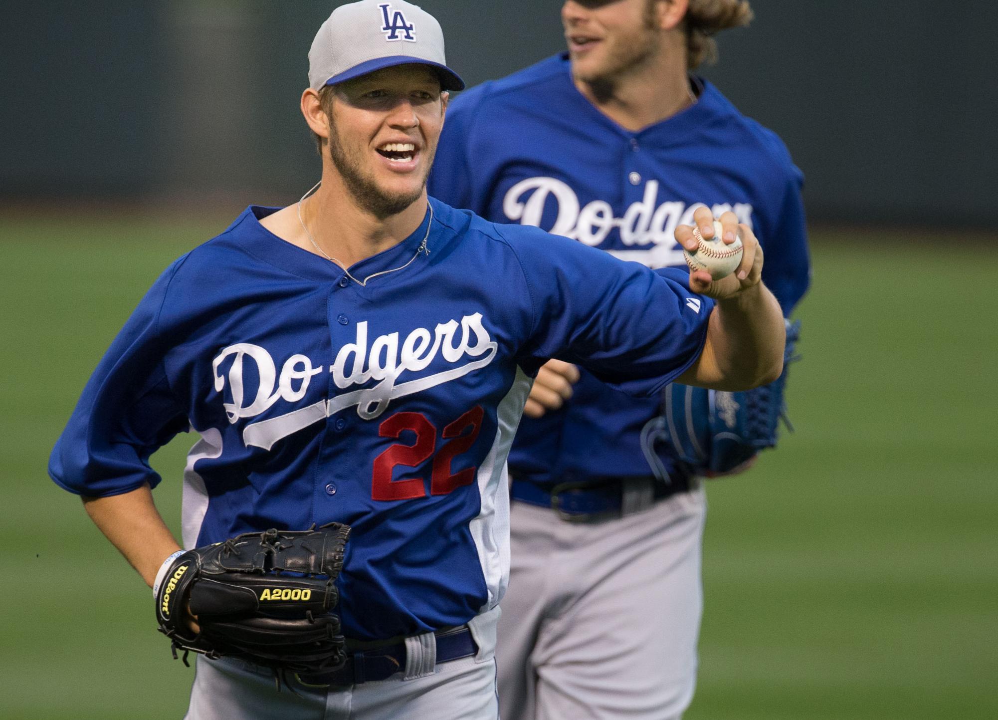 Kershaw joyfully running in after striking out the final batter of the inning. 
