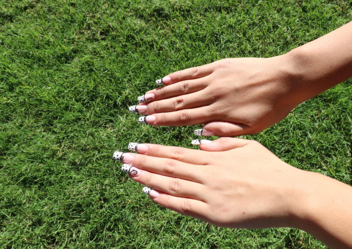 Abigail Trujillo’s Polka dot acrylic nails.