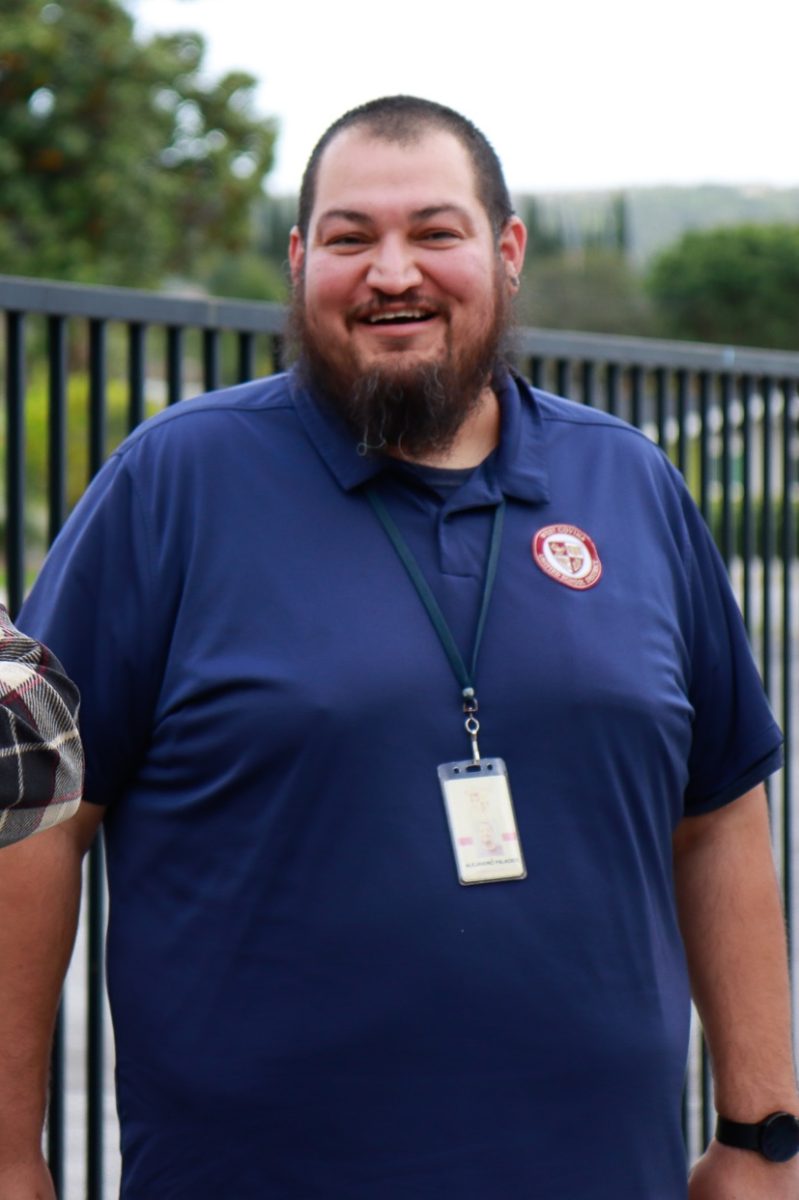 Watching over his students, Alex Palacios keeps things safe at the Pancake Breakfast in 2023.
