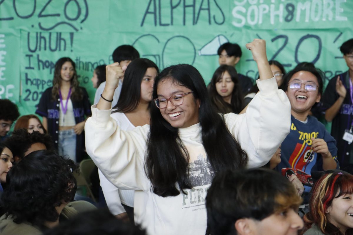 Sophomore Sophia Sanchez dances in the crowd. 