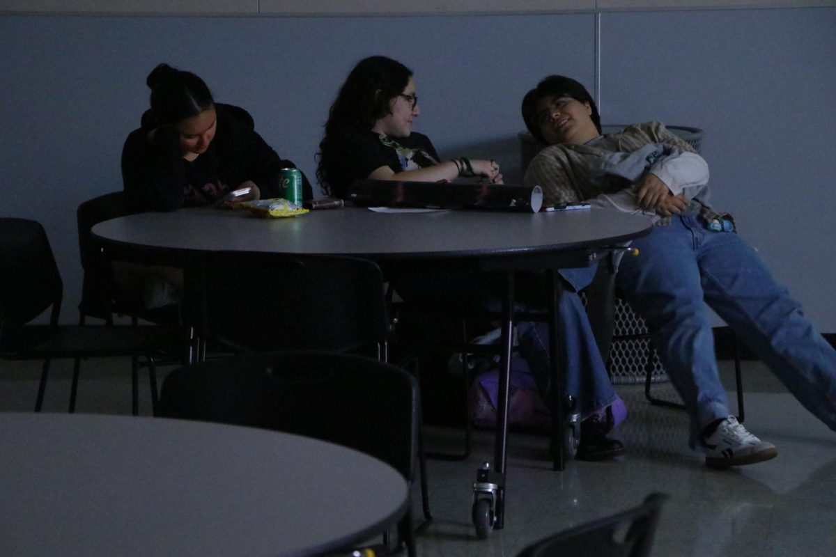Juniors Parisa Rodriguez, Bella Tavera-Gonzalez, and Emma Tavera hanging around and talking to each other about the movie.