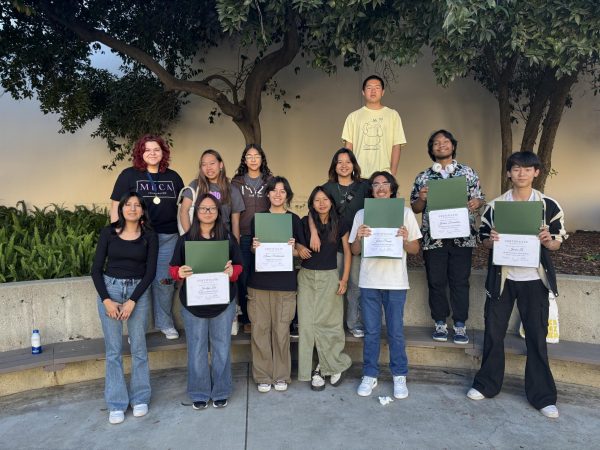 After the competition Desiree Vasquez (11), Autumn Pagan (12), Jocelyn Lee (11), Leyna Tran (10), Iliana Maldonado (10), Marisol Barragan (10), Rena Wang (10), Raeka Wang (10), Julian Puente (10), William Liu (10), Joshua Fermalino (12), Jason Li (9) (left to right) pose for a photo. (Image by Courtney Bell)