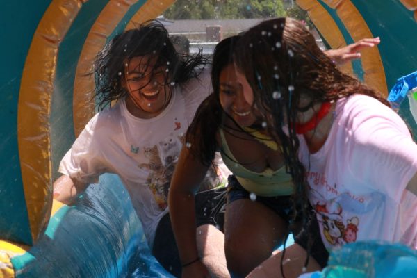 Summer Social 2026 featured Gladiator Jousting, a parachute, soccer, basketball, badminton, volleyball, a water slide, a slip n slide, and water gun fights.
